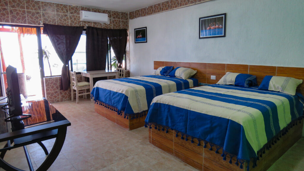 all rooms at Ria Maya Restaurant and Lodge have two double beds