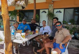 Guests fishermen  relaxing on the deck infront of Ria Maya Lodge in Rio Lagartos,Yucatan