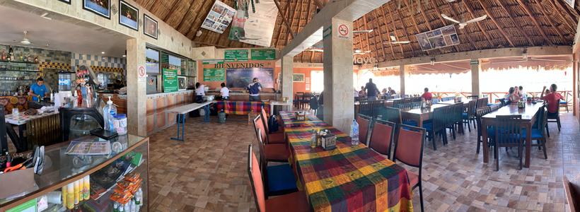 Ria Maya Restaurant in Rio Lagartos has  is  palapa roofed with a view on three side  from the second story restaurant 